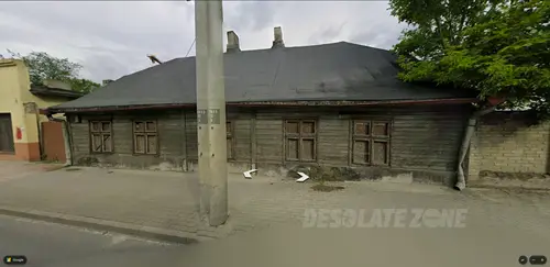 Opuszczony drewniany dom - zdjęcie 1/1