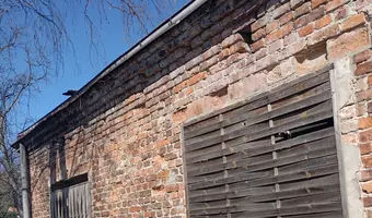 Ceglany dom zabity dechami - zdjęcie 2/2